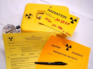 yellow metal box, source, isotope permit, warning panel